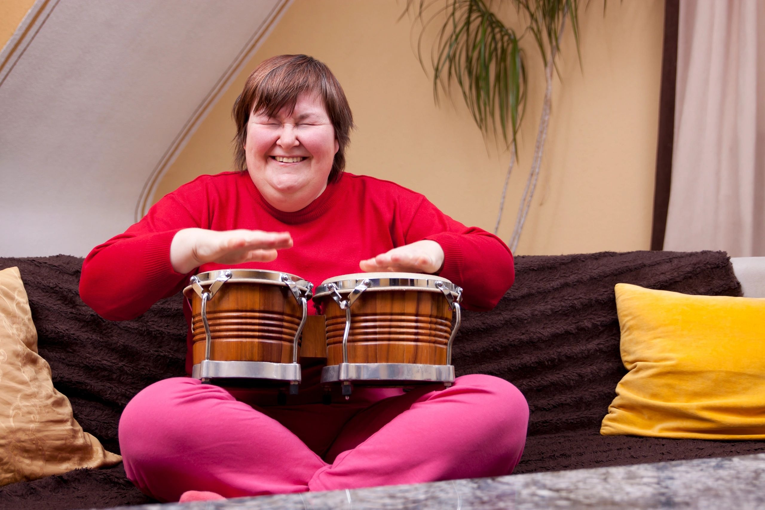 Woman playing bongo drums